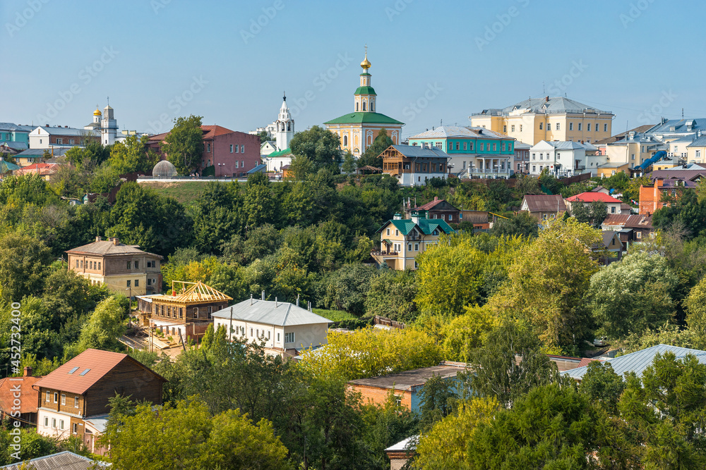 Vladimir city in Russia panoramic view. Authentic historical buildings, houses and churches in summer sunny day among green trees