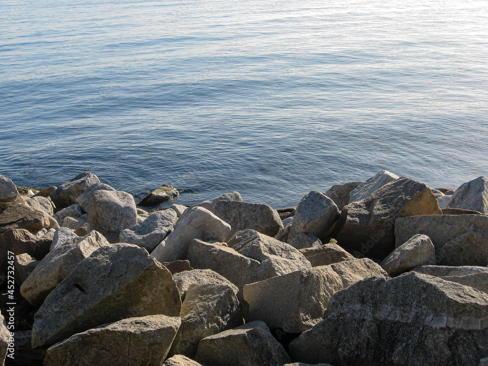 Rocks and sea in the harbor of Dun Laoghaire, Dublin Rocks and sea in the harbor of Dun Laoghaire, Dublin