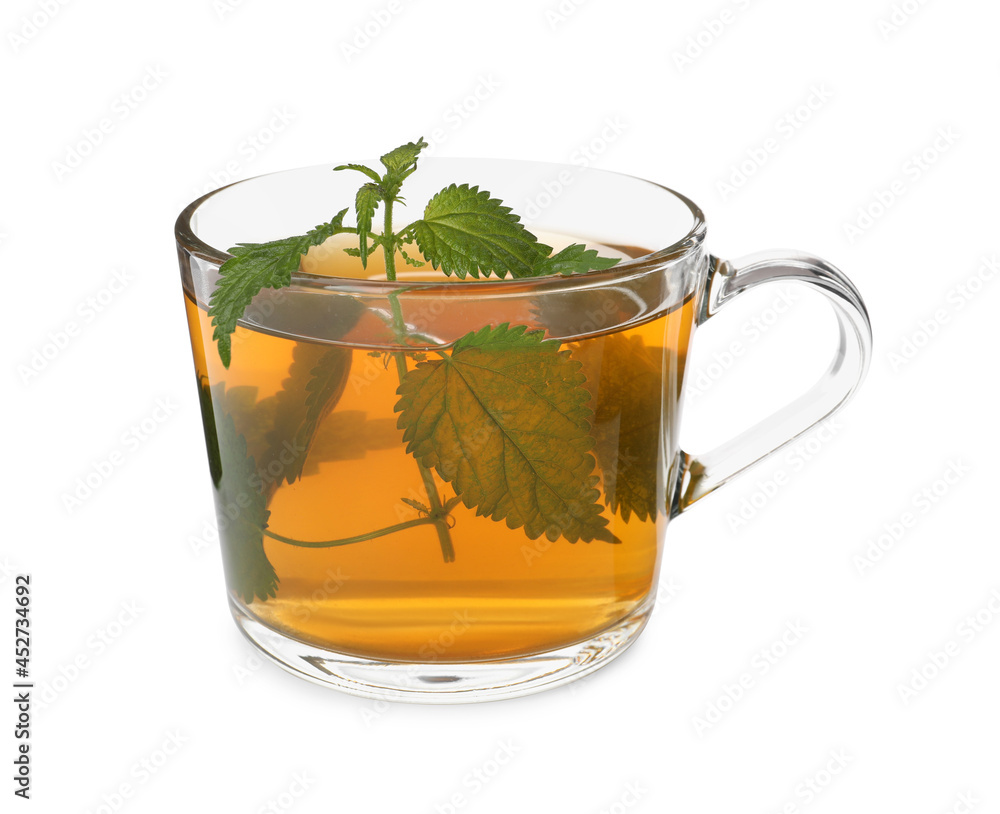 Glass cup of aromatic nettle tea on white background Glass cup of aromatic nettle tea on white background