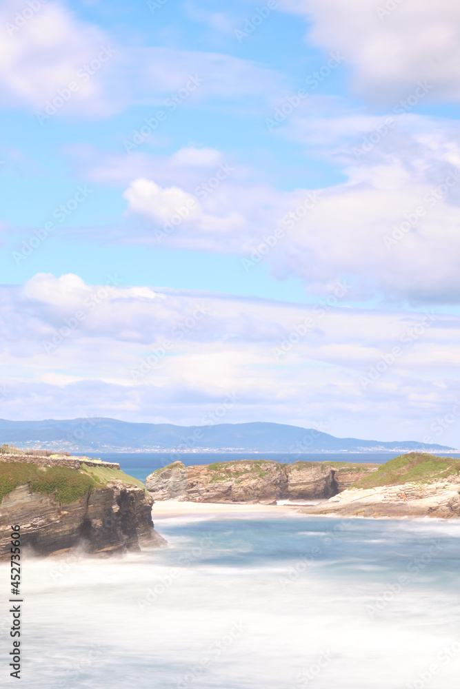 Fototapeta premium Os Castros beach at high tide in Galicia, Spain