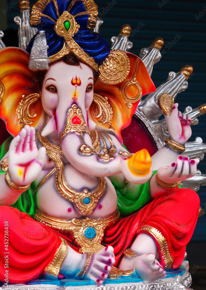 Indian Hindu God Ganesha idol, made out of plaster of paris, during ...