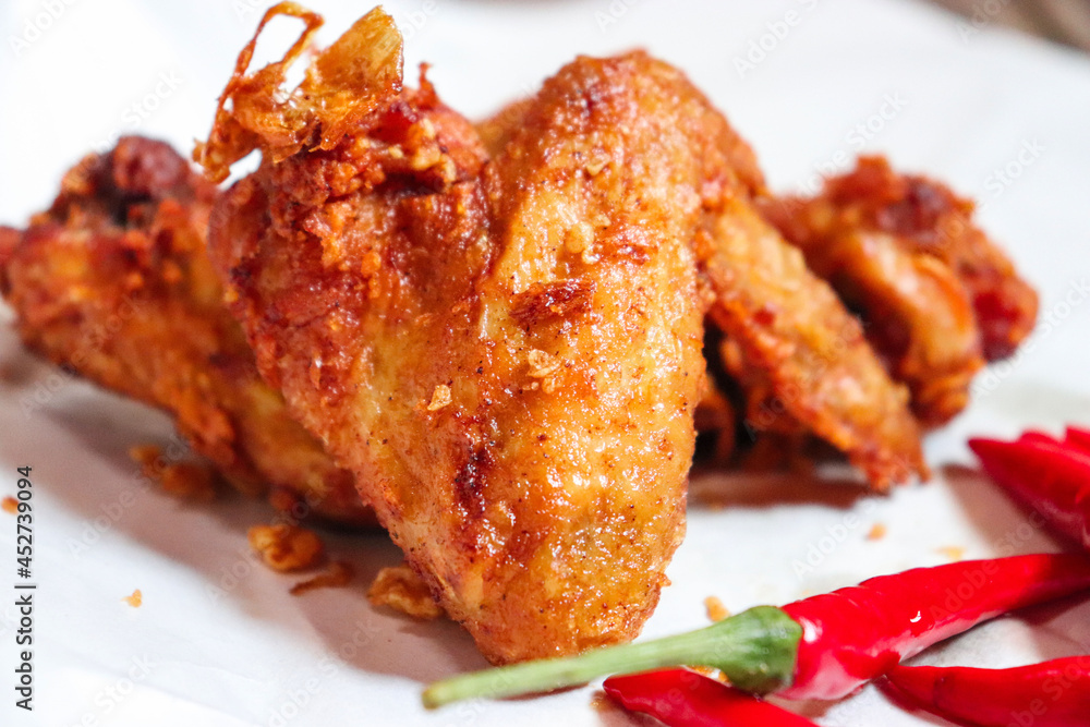 Delicious grilled chicken on a white background Delicious grilled chicken on a white background