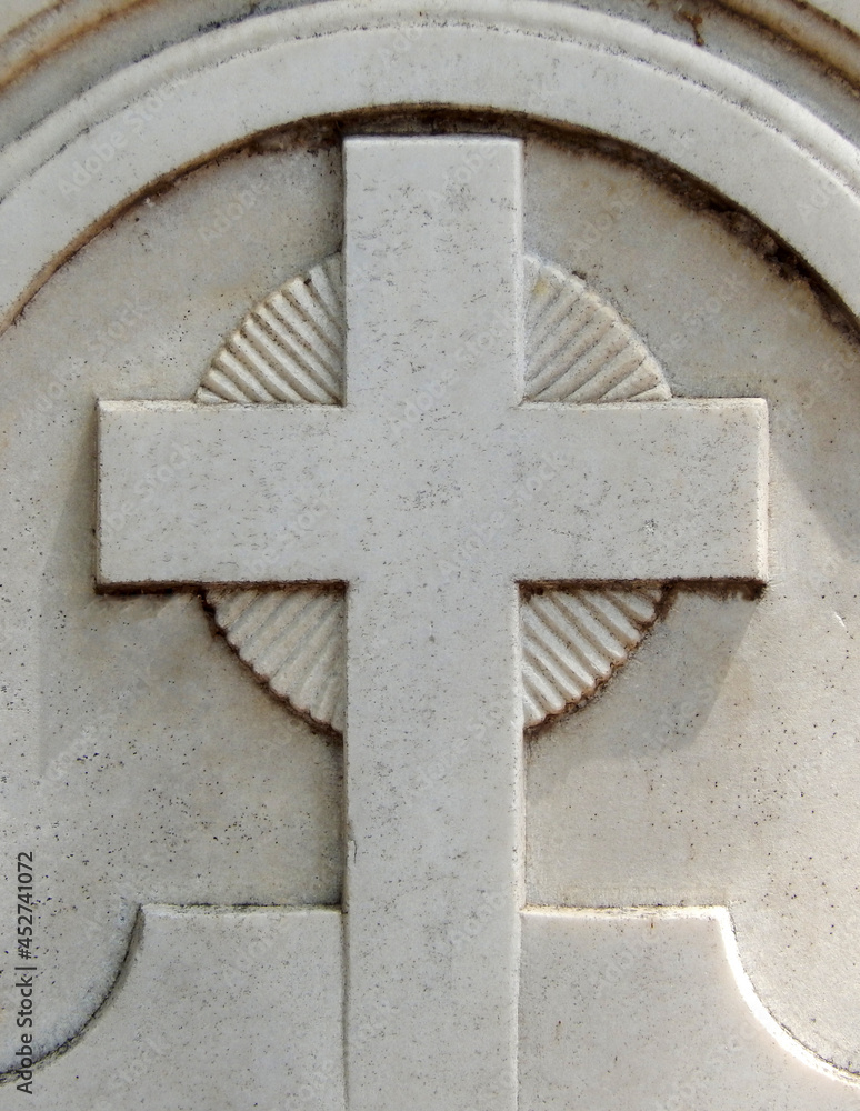  view of tomb stone in a christian cemetery