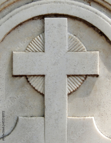  view of tomb stone in a christian cemetery