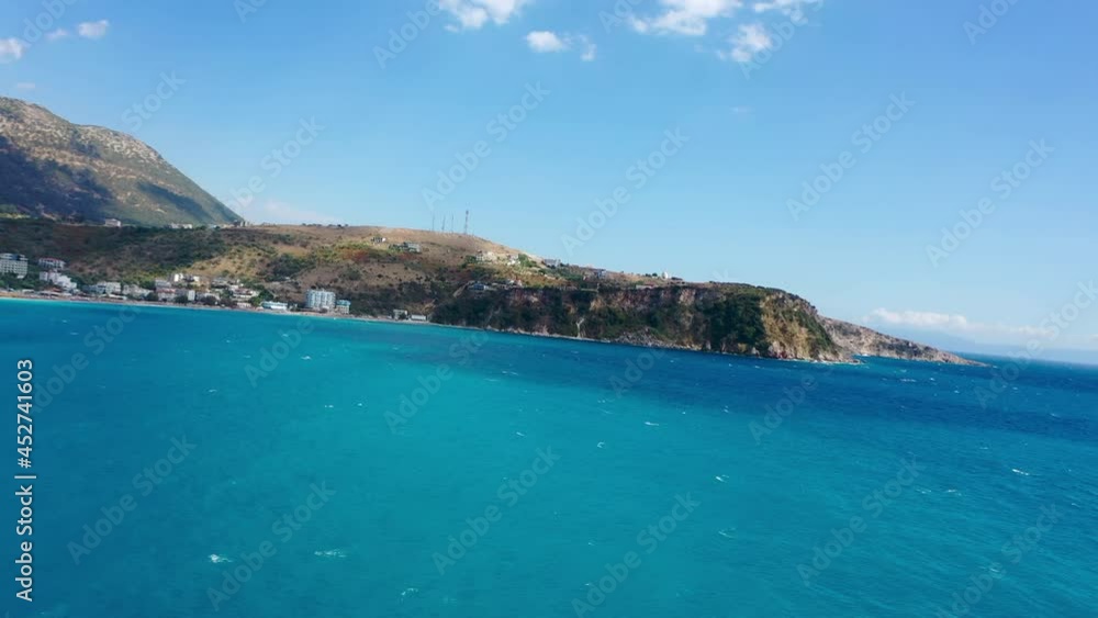 Birdseye view of Himara Beach and Adriatic Sea. Beautiful water Albania Riviera