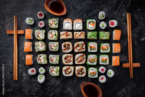 Sushi set isolated on black background. Photo for the menu and site. Top view. High quality photo
