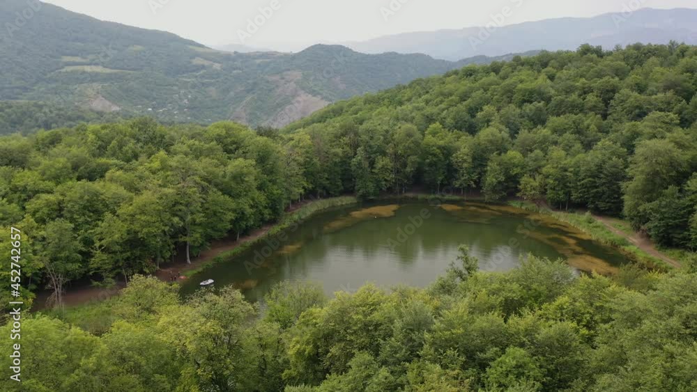 Aerial view lake Gosh lake in Armenia. Aerial view lake between green trees at summer time.
Tourists near lake. Discover y Armenia. Aerial view lake Gosh lake in Armenia. Aerial view lake between green trees at summer time.
Tourists near lake. Discover y Armenia.