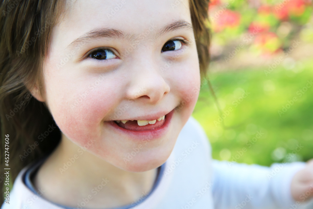 Portrait of little girl smiling outside Portrait of little girl smiling outside