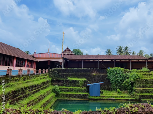 Ancient Kerala Temple ( Adoor Temple) architecture design view near the pond