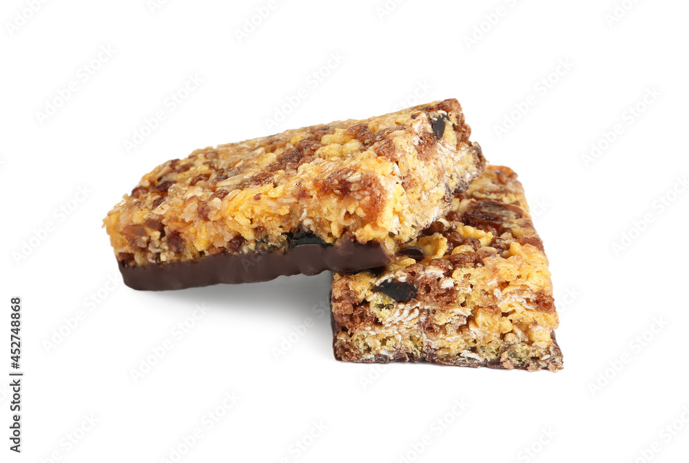 Halves of tasty protein bar with granola on white background Halves of tasty protein bar with granola on white background