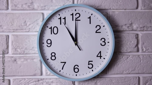 Wallpaper Mural Classic analog clock pointing at ten fifty five, isolated on white background. Five minutes to eleven on round the clock. Time concept Torontodigital.ca