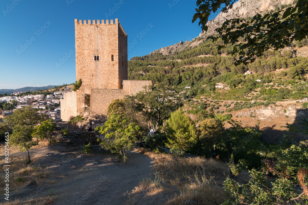 stone tower in an andalusian village stone tower in an andalusian village