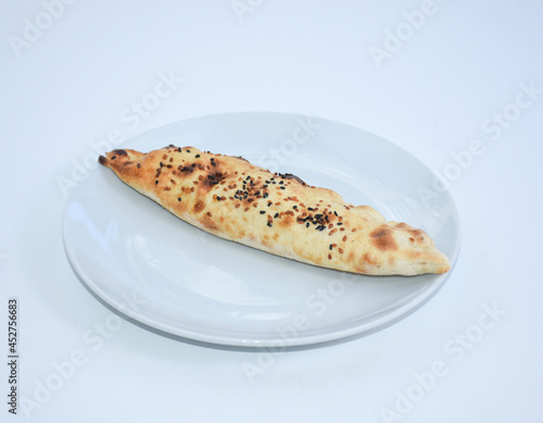 traditional sesame mince pie served on white plate