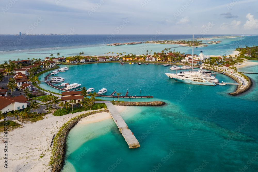 Marina at the Crossroads Maldives resort. Saii lagoon and hard rock hotel. Aerial drone picture. June 2021