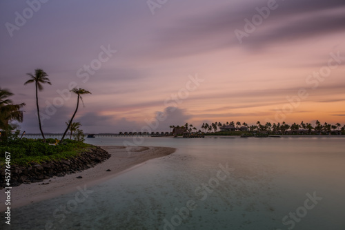 Fototapeta Naklejka Na Ścianę i Meble -  Beautiful colorful sunrise at tropical island on Maldives in Indian Ocean. Crossroads Maldives, saii lagoon and hard rock hotels. July 2021