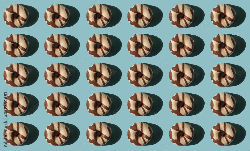 Top view of a donuts on blue background Top view of a donuts on blue background
