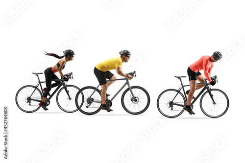 Young people riding road bicycles