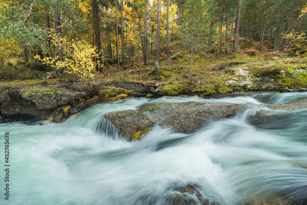 River with fast aqua streams in mountains River with fast aqua streams in mountains