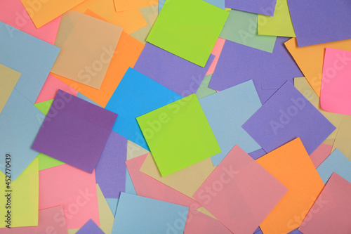 Many colorful stickers as background, top view