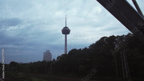 Wallpaper Mural Smooth Timelapse of the Colonius Tower in cologne. Trains passing by. Clouds moving. Camera slides from right to left. speed 200 Torontodigital.ca