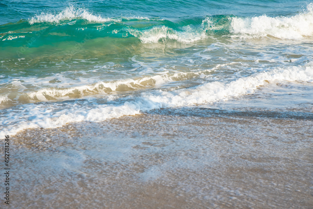 Sea or ocean tropical landscape view. Sea waves under the sun. Summer vacation and travel concept. Water wave surface. Sand beach. Sea or ocean tropical landscape view. Sea waves under the sun. Summer vacation and travel concept. Water wave surface. Sand beach.