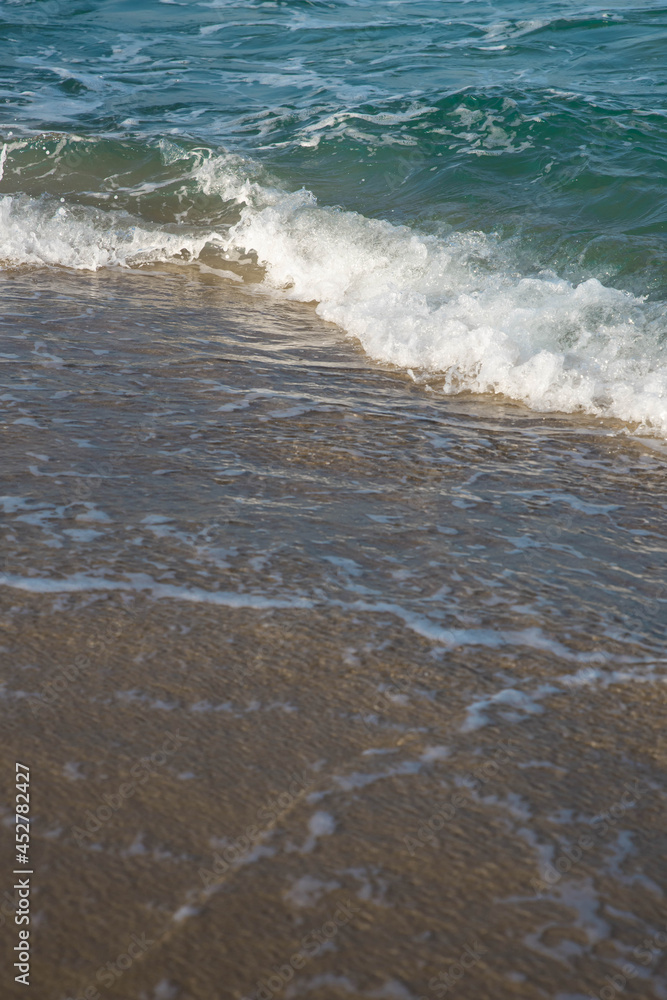 Sea or ocean tropical landscape view. Sea waves under the sun. Summer vacation and travel concept. Water wave surface. Sand beach. Sea or ocean tropical landscape view. Sea waves under the sun. Summer vacation and travel concept. Water wave surface. Sand beach.