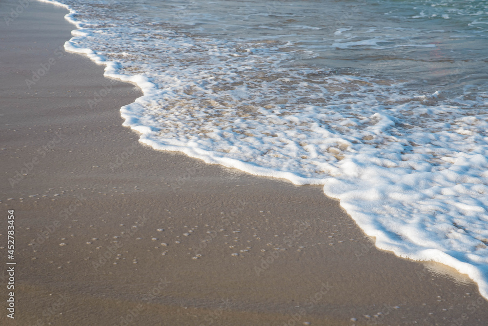 Sea or ocean tropical landscape view. Sea waves under the sun. Summer vacation and travel concept. Water wave surface. Sand beach. Sea or ocean tropical landscape view. Sea waves under the sun. Summer vacation and travel concept. Water wave surface. Sand beach.