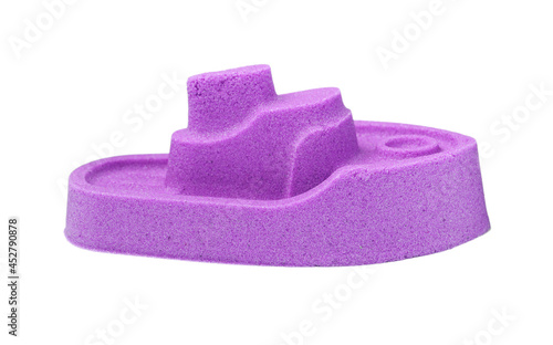 Ship made of kinetic sand on white background