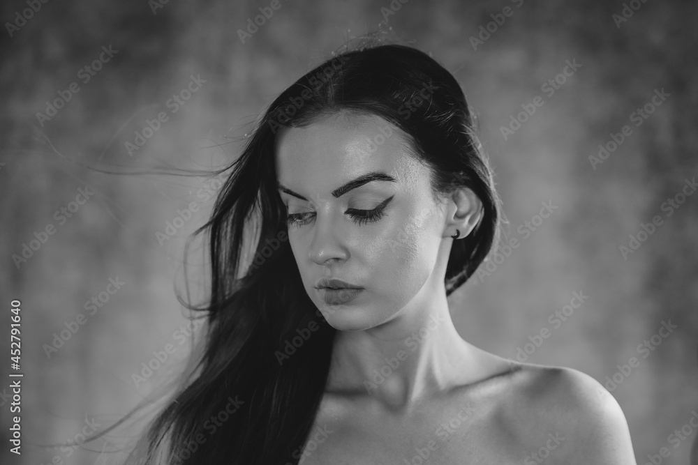 Portrait shot of a pretty young woman. Black and white photography Portrait shot of a pretty young woman. Black and white photography