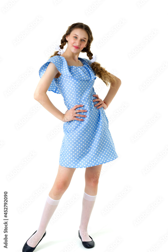 Full length portrait of girl in polka dot dress Full length portrait of girl in polka dot dress