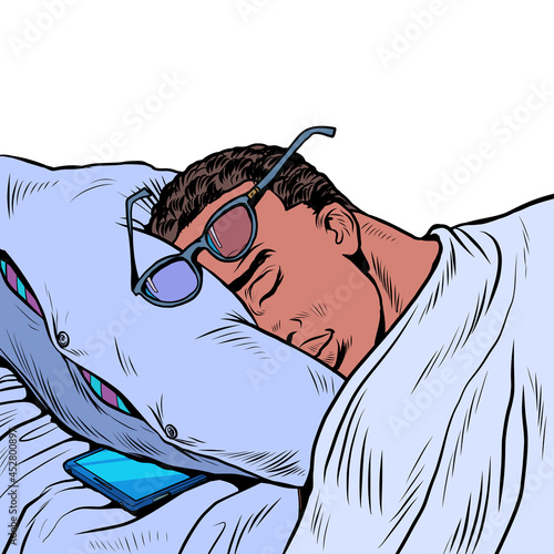 A black man is sleeping with glasses, a phone is lying next to him. Businessman daily routine