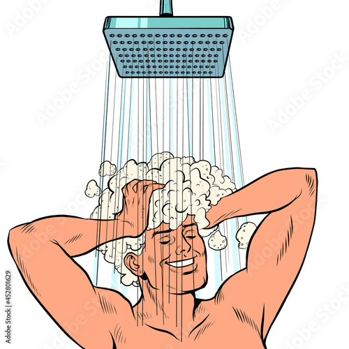 a man washes his hair in the shower. Businessman daily routine