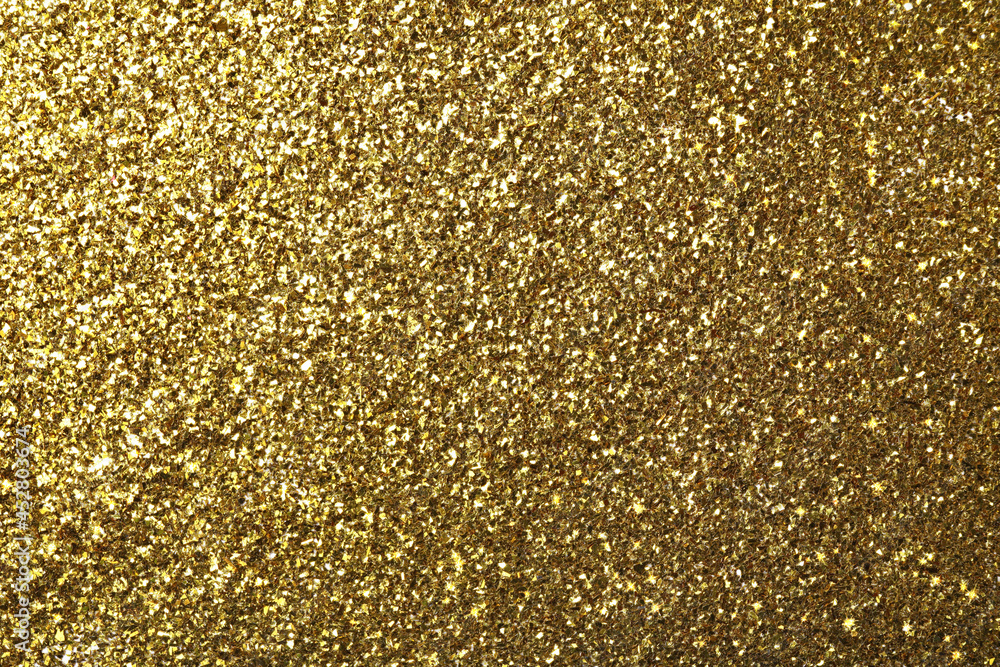 Beautiful shiny golden glitter as background, closeup Beautiful shiny golden glitter as background, closeup
