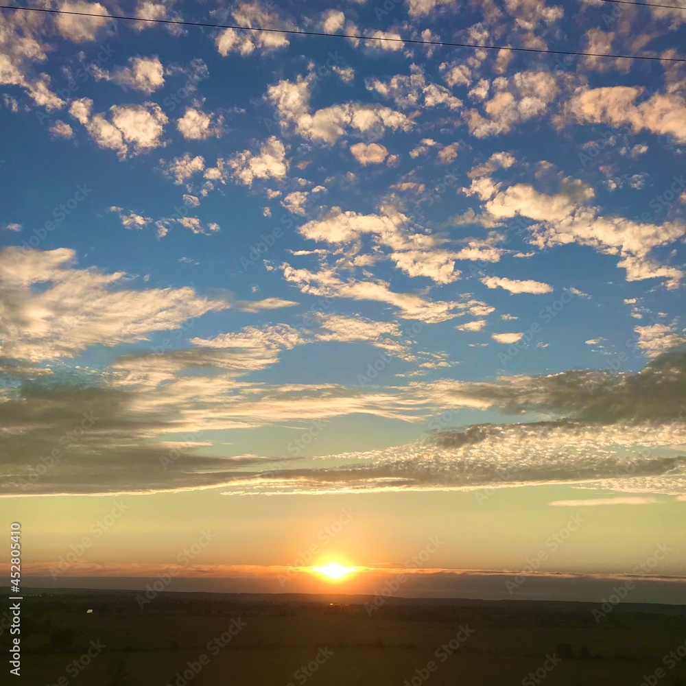 Fototapeta premium sunset over the field