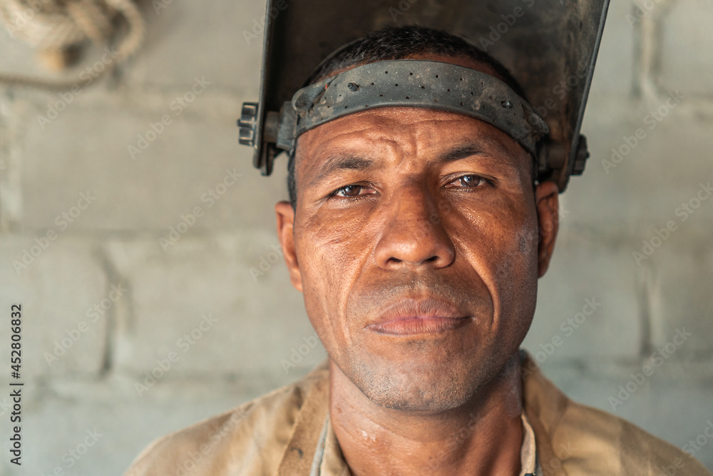 Portrait Of Latin Welder Working At Workshop Portrait Of Latin Welder Working At Workshop