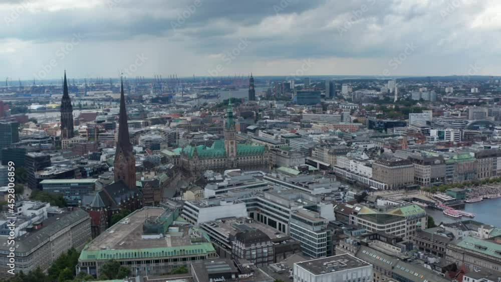 Orbit shot around City hall building with tall tower and green roof. Aerial view of landmarks in Altstadt district. Free and Hanseatic City of Hamburg, Germany Orbit shot around City hall building with tall tower and green roof. Aerial view of landmarks in Altstadt district. Free and Hanseatic City of Hamburg, Germany