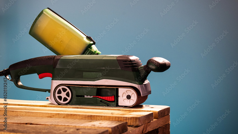 Electrical sander in a workshop Electrical sander in a workshop