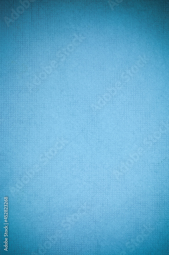 Textured recycling paper blue background.