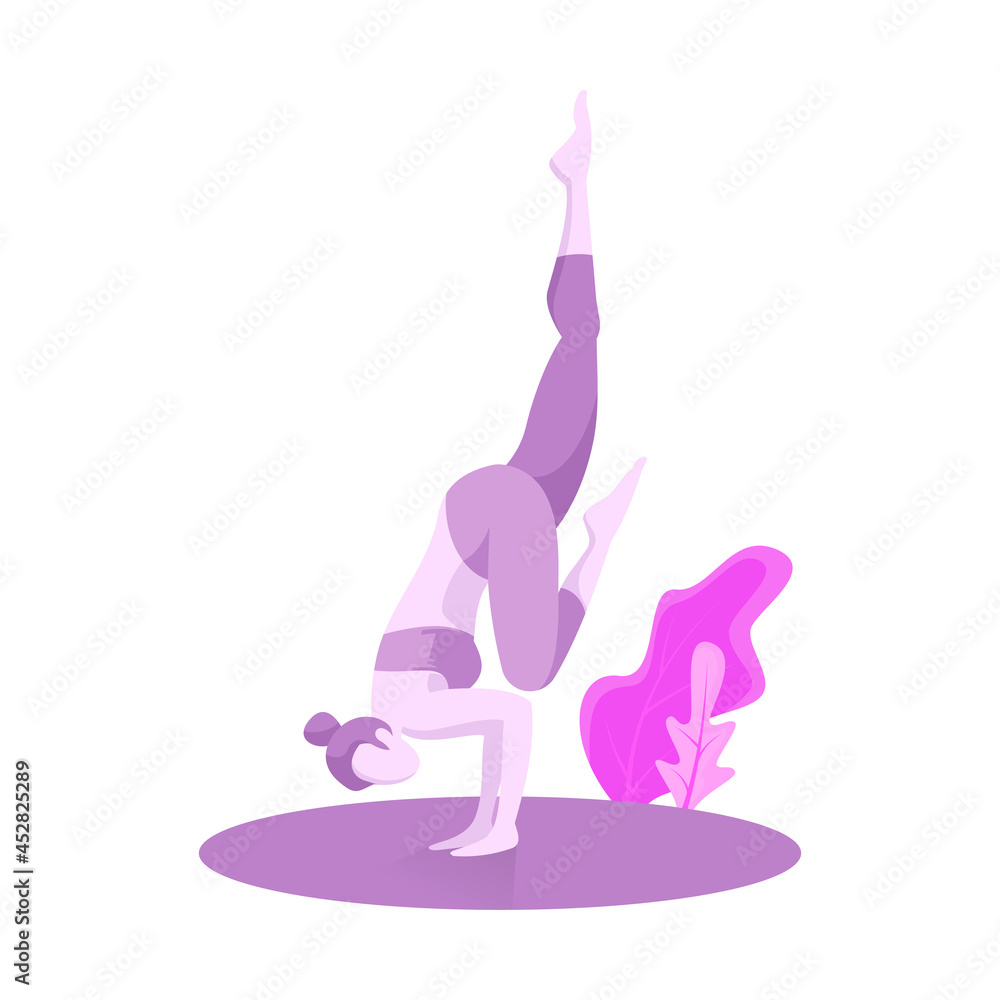 Woman doing handstand practicing yoga posture Woman doing handstand practicing yoga posture
