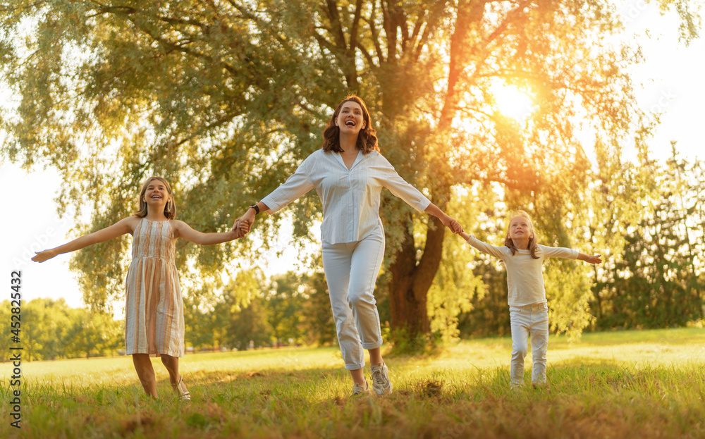 Happy family at sunset Happy family at sunset