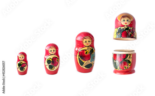 Matryoshka doll set in a row isolated. A symbol of the feminine side of Russian traditional and culture. Wooden doll toys. Crafts, painting and art. photo