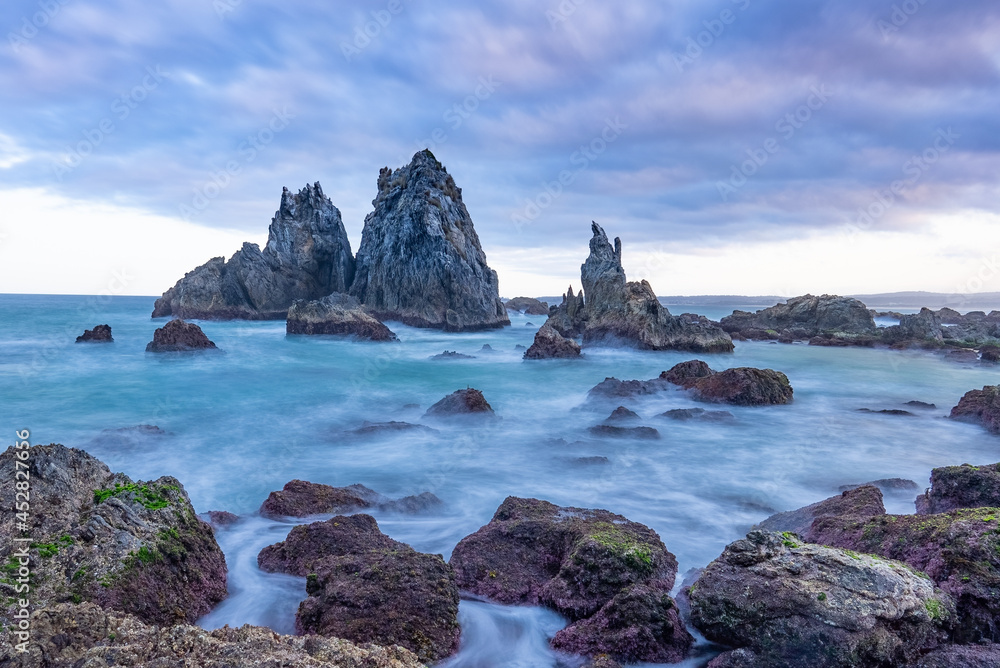 dusk long exposure shot of camel rock at bermagui during a spring afternoon on the nsw south coast