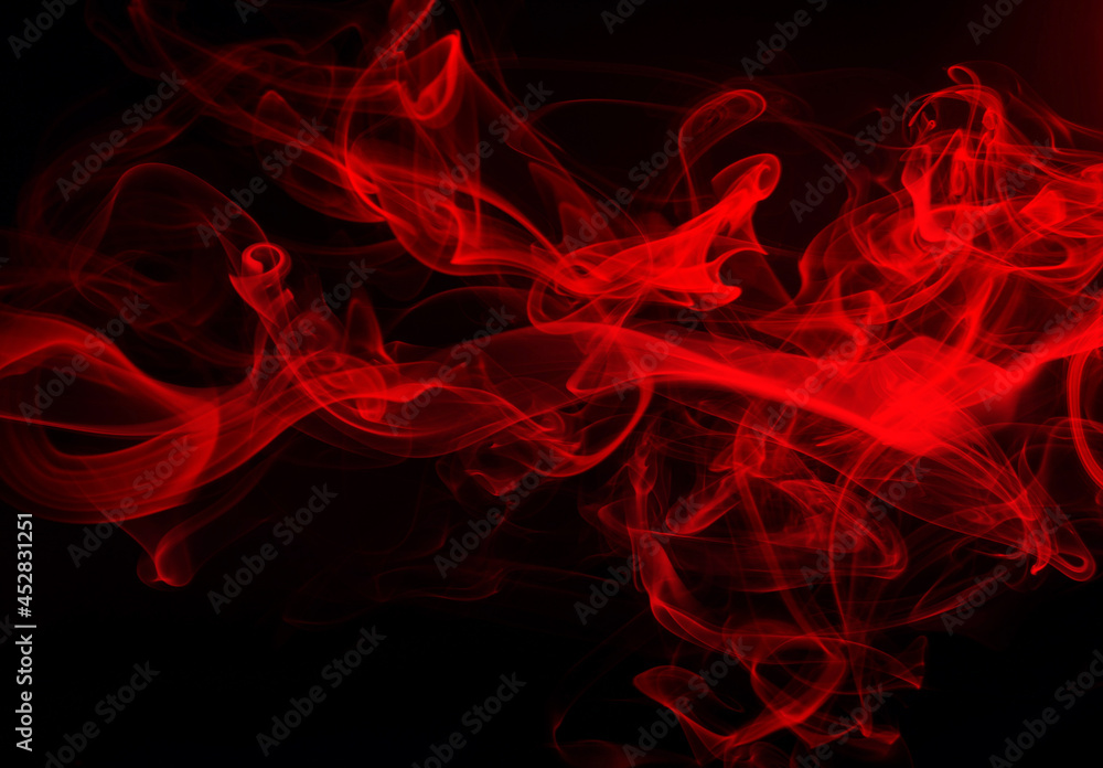 Red smoke abstract on black background, fire design and darkness concept Red smoke abstract on black background, fire design and darkness concept