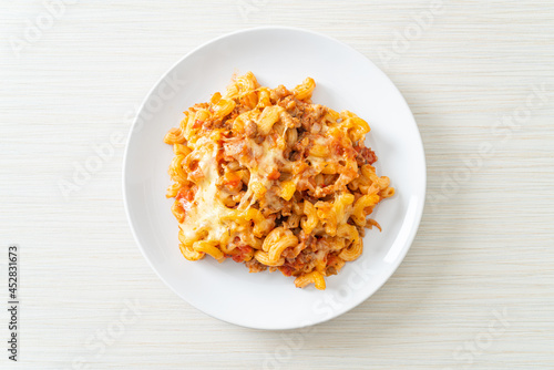 homemade macaroni bolognese with cheese