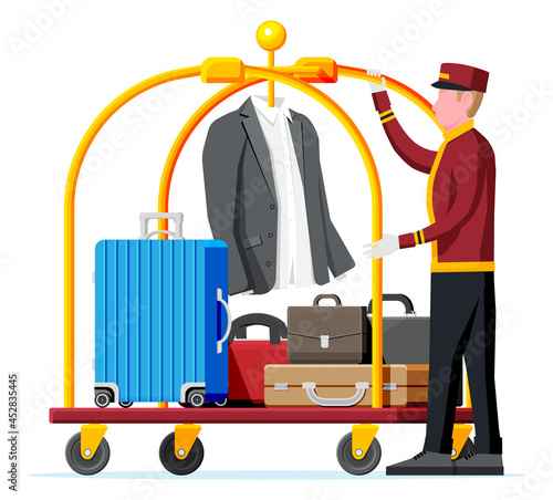 Hotel Luggage Cart Full of Luggage and Bellhop