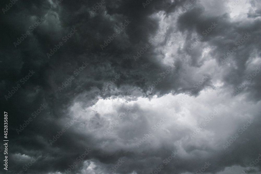 Swirling angry menacing dark grey stormy clouds Swirling angry menacing dark grey stormy clouds