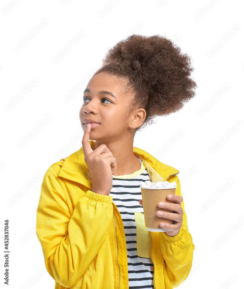 Stylish African-American teenage girl with cup of hot cacao on white background Stylish African-American teenage girl with cup of hot cacao on white background