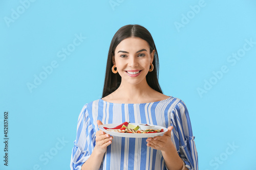 Beautiful young woman with ...