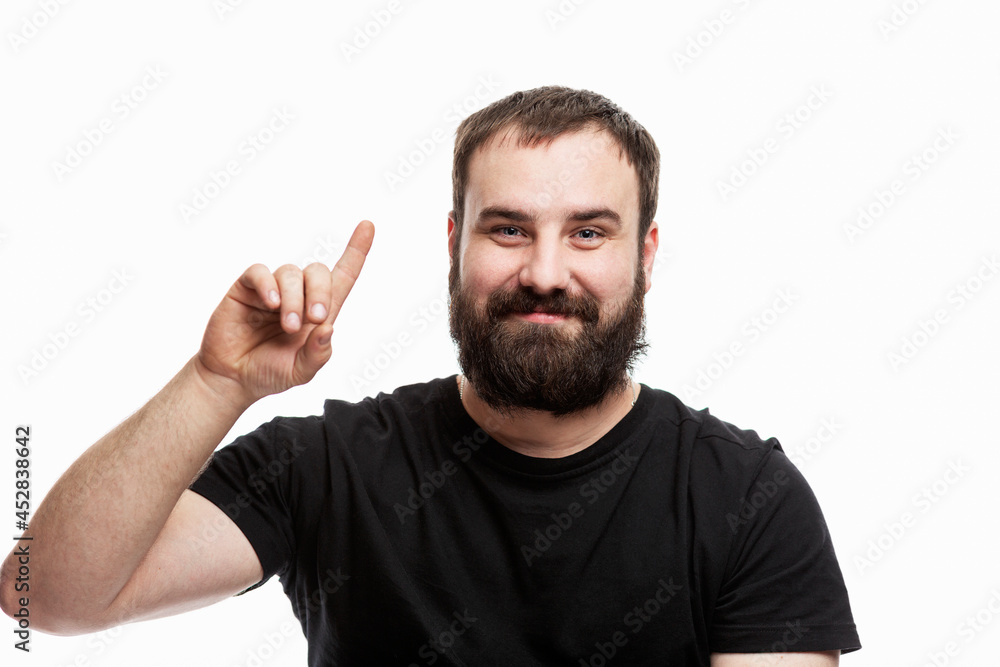 The man with the beard raised his index finger up. I have an idea! White background. The man with the beard raised his index finger up. I have an idea! White background.