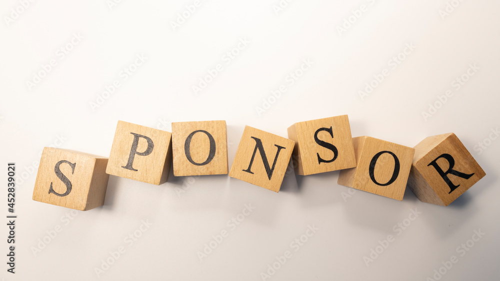 Sponsor word crafted from wooden cubesfinance and business. Sponsor word crafted from wooden cubesfinance and business.